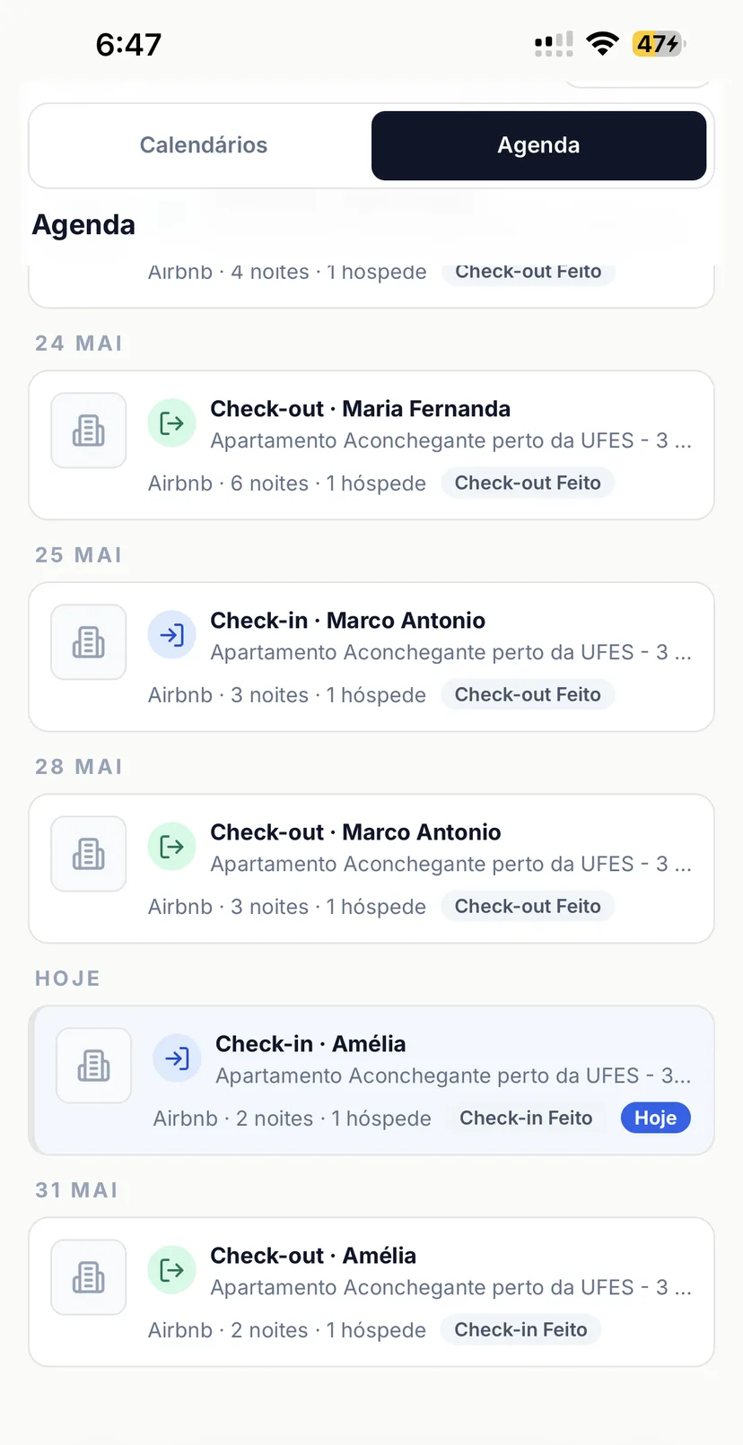 Tela mobile real do Operent com agenda de reservas, check-ins, check-outs, hóspedes, imóveis e status