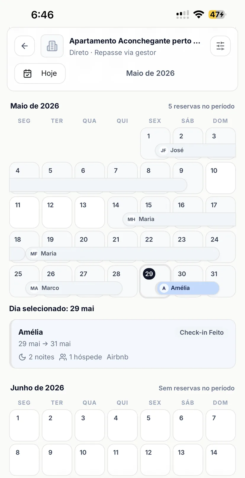 Tela mobile do Operent com calendário de reservas por imóvel, períodos ocupados, hóspedes e dia selecionado